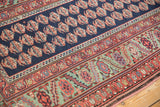 Nuanced striation in the lime green border of an antique Persian Malayer runner with boteh motifs.