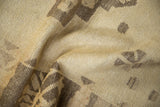 Hand-knotted pile of a distressed Oushak runner showing even wear in sand and coffee brown.