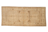 Distressed vintage Oushak runner, triple gul medallions, primitive floral border, cream and beige.
