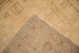 Distressed Oushak runner texture, showing low pile and dense hand-knotted backing.