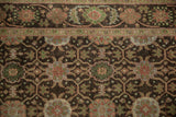 Sivas runner's floral roundels in jade green, powder blue, and rust on pale coffee brown.
