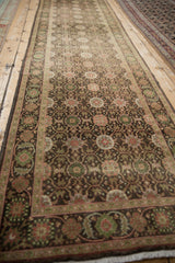 Vintage Sivas runner detail with coffee brown field, scrolling floral vines, jade green blossoms.