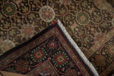 Saturated reverse and muted face of a vintage Sivas rug, showing distinct border.