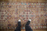 Antique Serab runner's hexagonal medallion, bursting floral and geometric patterns, showing aged pile.