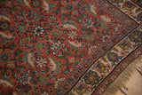 Herati design field, floral blossom border, and fringe corner of a vintage Bijar runner.