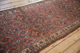 Condition detail of the vintage Bijar runner's side cord selvedge and main floral border.