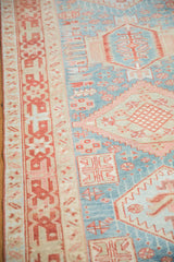 Evenly worn pile on a Karaja runner showing geometric patterns in blue and dusty red.