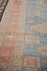 Even wear across the knot heads on the vintage Karaja runner's geometric pattern.