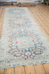 Vintage distressed Bakhtiari runner with floral bouquets and Samovar border in soft blue, blush.