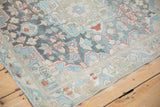 Distressed Bakhtiari runner's Samovar arabesque border and field, with soft blue, red, ivory.