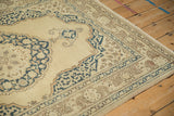 Navy blue Safavid arabesque main border of a hand-knotted vintage Tabriz rug.