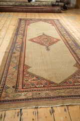 Antique Serab runner shown from a low angle, highlighting its scale and traditional geometric pattern.