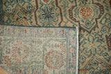 Corner view showing the hand-knotted foundation and even wear of a vintage Malayer rug.