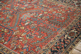 Close-up of the Turtle Samovar motif and geometric field on a vintage Heriz carpet.