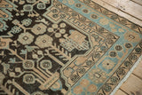 Low-pile texture and geometric borders in sky blue and beige on a vintage Hamadan rug.
