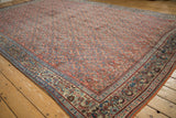 Vintage Bijar carpet corner: Herati field in brick red, intricate beige germinating plant border.