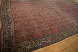 Hand-knotted Bijar carpet border with germinating plant and leaf motif on pale green-beige.