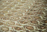 Distressed field of a vintage Hamadan, with terracotta, chocolate, and gold boteh lattice.