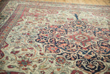 Low angle revealing the fine weave and even texture of the antique Kerman's knotted pile.