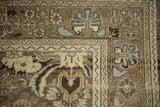 Bibikabad carpet corner detail, displaying distressed floral cross-sections and pale powder blue motifs.