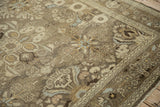 Distressed Bibikabad carpet texture, showing crown shyness floral sprays in beige, ivory, pale blue.