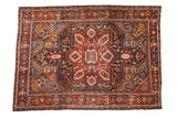 Vintage Heriz carpet, cherry red and navy blue oversized medallion, 7'5