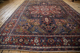 Heriz carpet border detail with Turtle Samovar motifs, deep cherry red and sapphire blue.