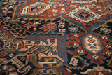 Vintage Heriz carpet detail, Turtle Samovar border and Herati patterns in cherry red, deep navy.
