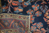 A fine Lilihan carpet's corner is folded, revealing the tight weave and intact side cord selvage.