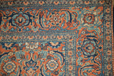Tabriz carpet corner showing intricate Herati and Turtle Samovar border motif.