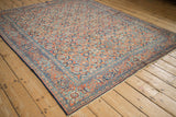 Vintage Tabriz carpet corner with brick red Herati field and navy blue Turtle Samovar border.