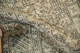 Even, low-pile texture and geometric blossom motifs on a vintage hand-knotted Karaja runner.