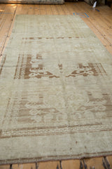 Distressed pale coffee brown Samovar floral motifs on an oxidized silver Oushak runner.