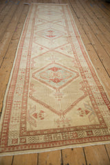 Angled view of a vintage Serab runner highlighting its full length and repeating geometric medallions.