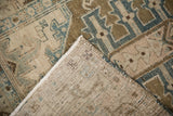 Distressed Heriz rug pile and hand-knotted foundation with mostly even wear.