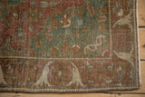 Antique Distressed Farahan Sarouk rug corner: bell-shaped border, faded red, jade green motifs.