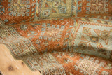 Distressed texture of a vintage Heriz rug, highlighting mostly even wear to knot heads.