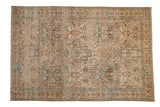 Vintage distressed Tabriz carpet with large leaves and vines in a lattice design of beige, powder blue, and brown.