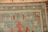 Detail of distressed Veece runner, showing time-softened ruby red, slate blue pile and wear.