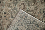Distressed Karaja rug detail showing even wear, foundation through knot heads, geometric motifs, and selvage.
