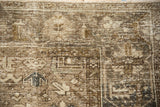 Distressed Mehrivan carpet showing mostly even wear with visible knot heads and foundation.