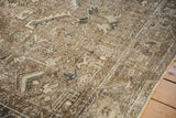 Distressed pile of a vintage Mehrivan carpet showing mostly even wear to the knot heads.
