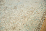 Detail of the Turtle Samovar border on a vintage Mehrivan carpet with soft, low pile.