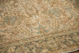 Distressed low pile of a vintage Persian carpet with coffee brown and slate blue geometric and border motifs.