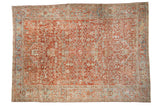 Distressed vintage Heriz carpet with a ruby red allover design and a dusty blue Samovar Turtle border.