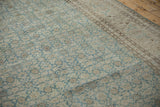 Evenly worn texture of a vintage Tabriz carpet with a dusty blue and beige Herati motif.