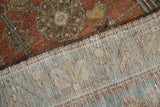 Hand-knotted foundation and restored side cord of a vintage distressed Mazlaghan rug.