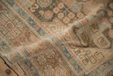 Even wear across the knot heads of a distressed Hamadan rug showing faint foundation.