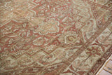 Mostly even wear on the hand-knotted pile of this distressed vintage Baktiari carpet.