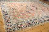 Gorevan rug's intricate navy blue Turtle Samovar design border and pale brick red field.